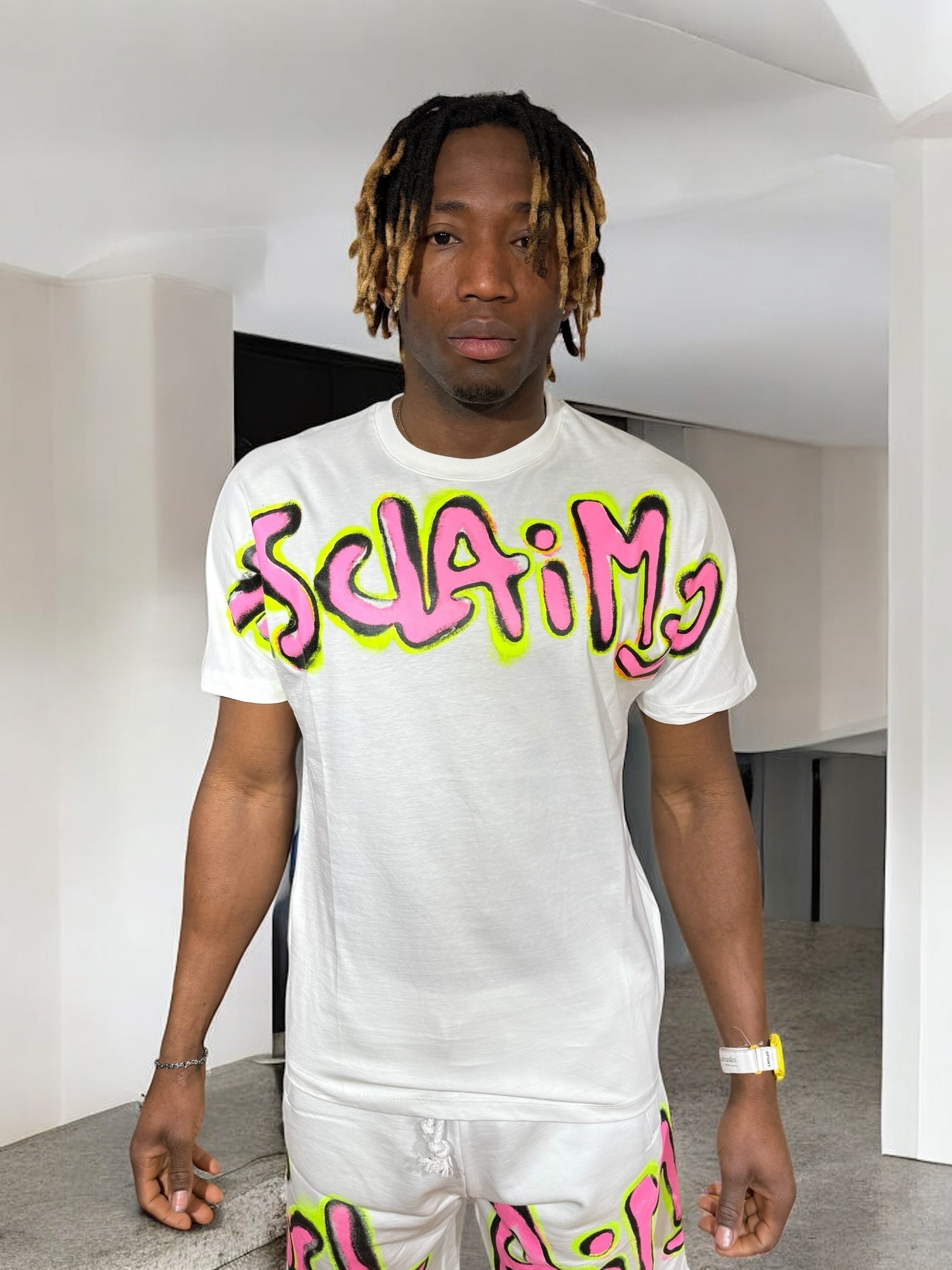 TEE DISCLAIMER PINK FLUO