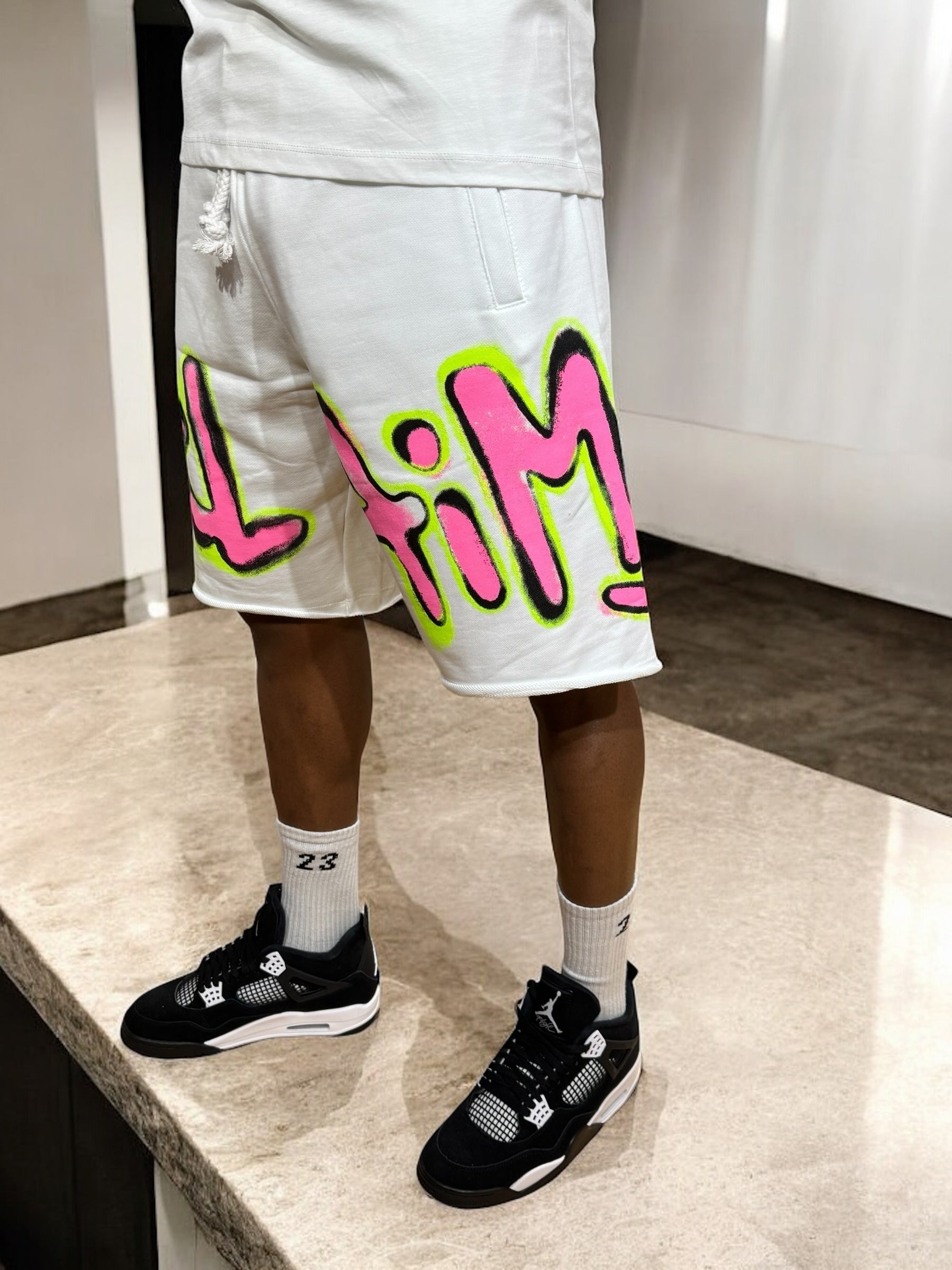 BERMDUA DISCLAIMER PINK FLUO