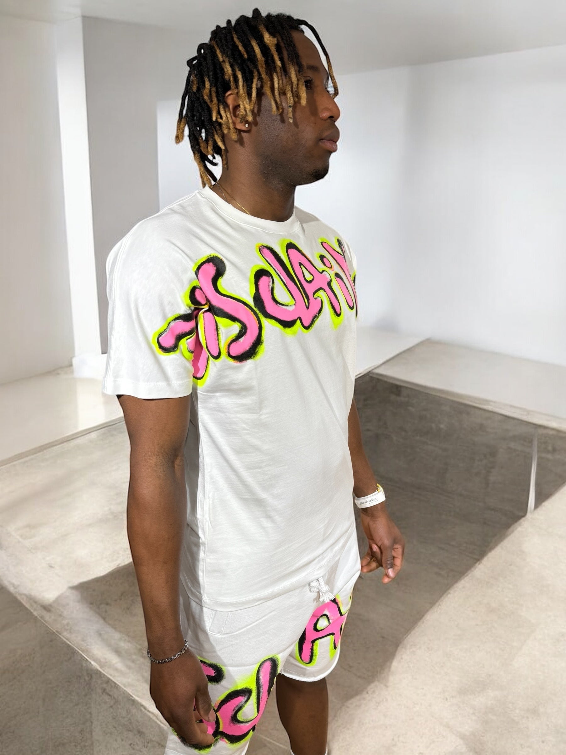 TEE DISCLAIMER PINK FLUO