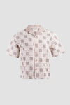 Camicia abbottonata all'uncinetto con motivo floreale