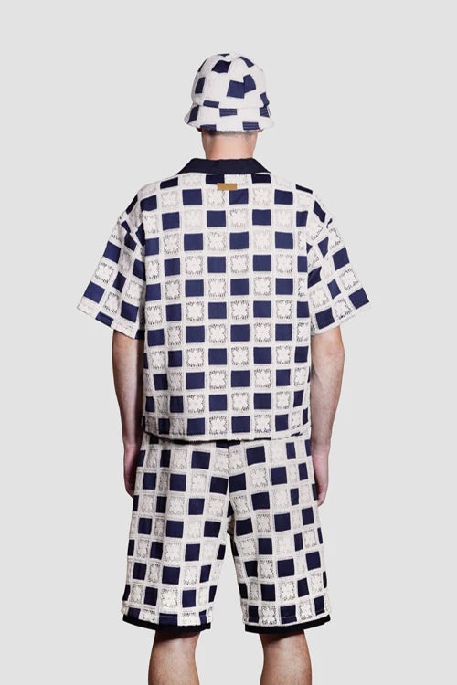 Pantaloncini all'uncinetto con motivo floreale